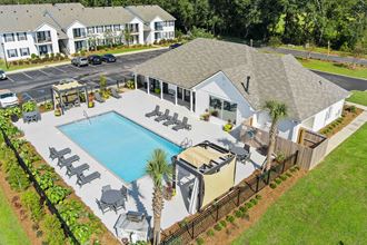 Drone View Of Pool And Exterior at Baldwin Farms Apartments, Alabama - Photo Gallery 5