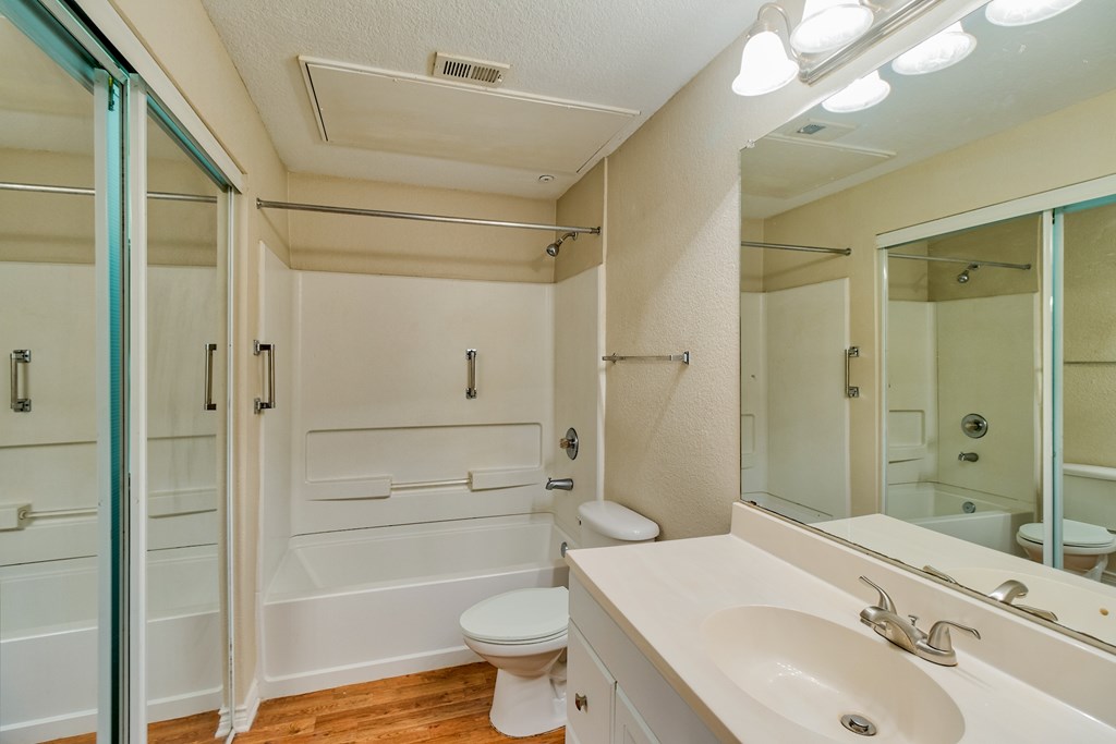 A Bathroom With White Toilet at Villas at Bon Secour Apartments, Gulf Shores, AL