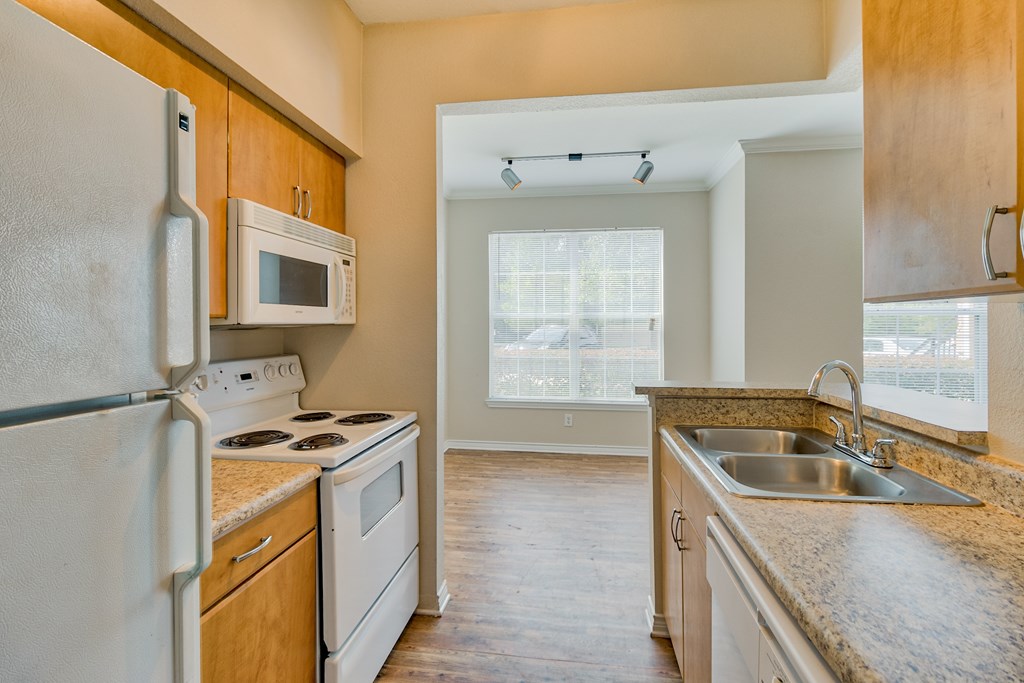 A Kitchen With a Microwave at Villas at Bon Secour Apartments, Gulf Shores