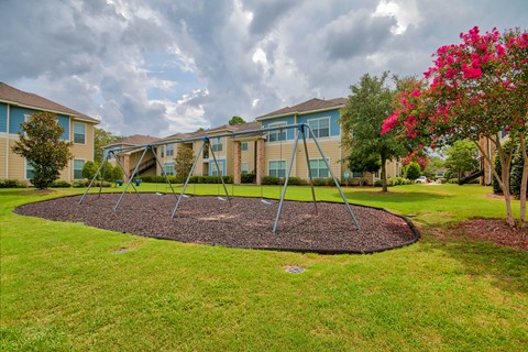 A Playground With a Swing at Villas at Bon Secour Apartments, Gulf Shores, 36542
