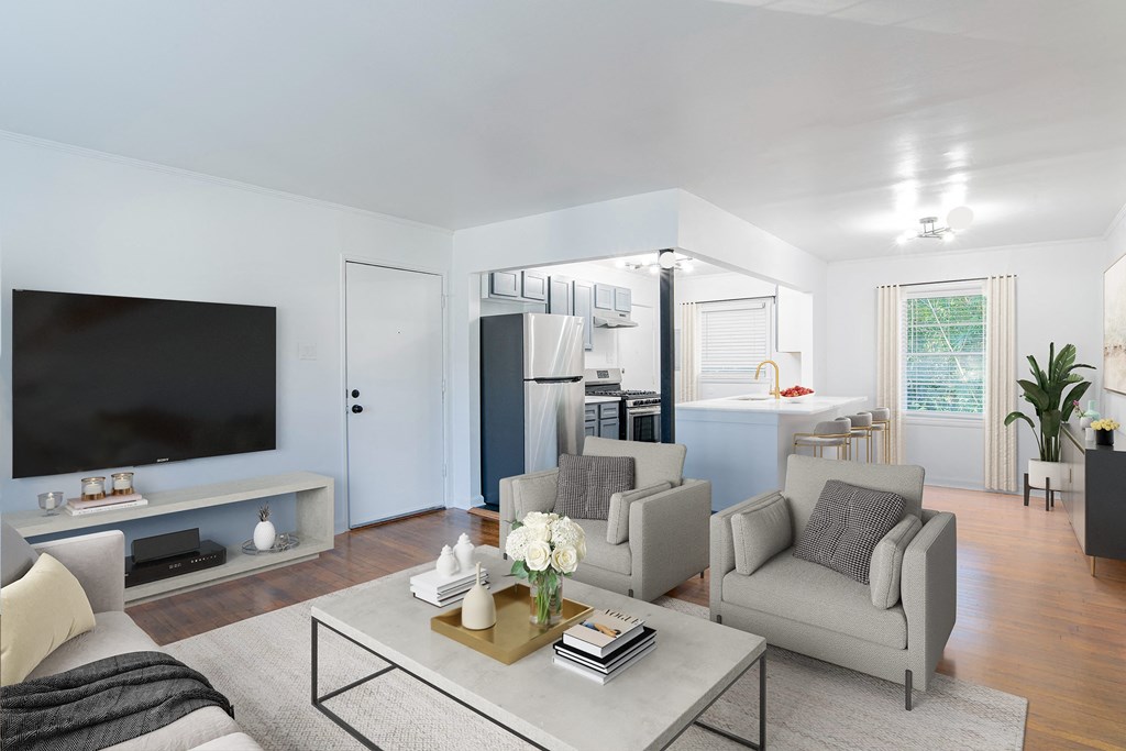 a living room with a couch and a coffee table at Ann Street Lofts, Mobile Alabama