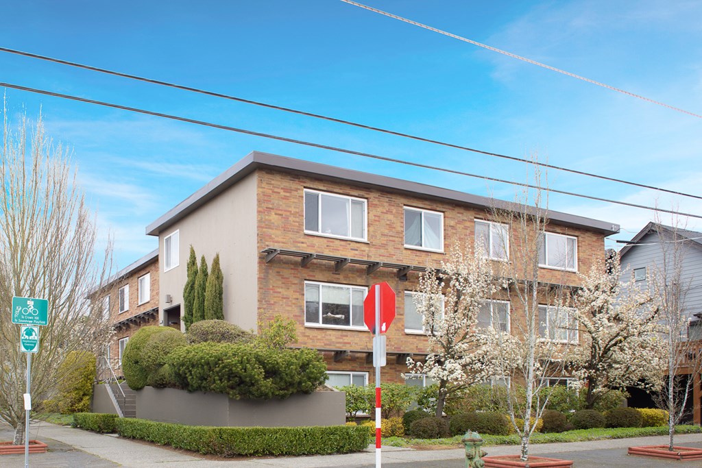 a building with a stop sign in front of it