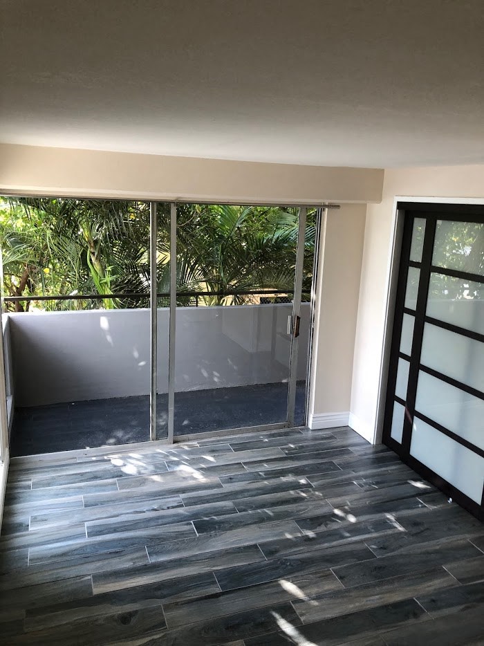 Napili Towers bedroom with closet and glass doors to the balcony