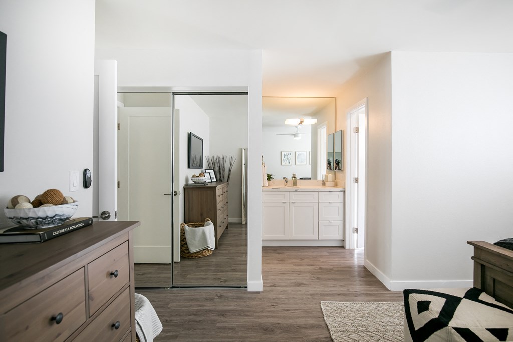 Park View on Yukon furnished bedroom with mirror closet and bathroom