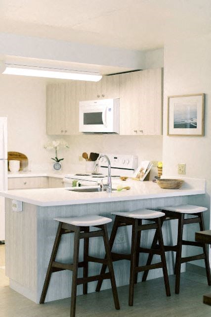 Kanekapolei Collection Kitchen Area with bar counter and seating