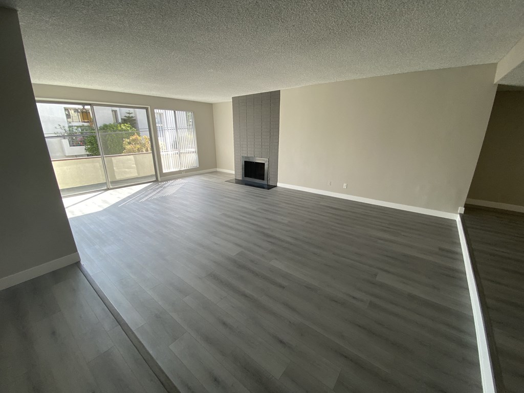 11858 Goshen Ave Unit 207 living room with fireplace