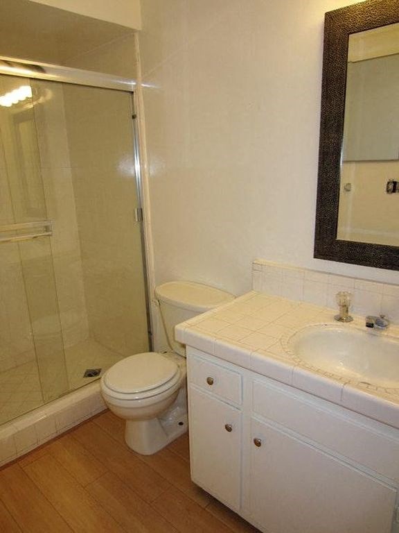 1301 Havenhurst bathroom vanity, toilet, and shower