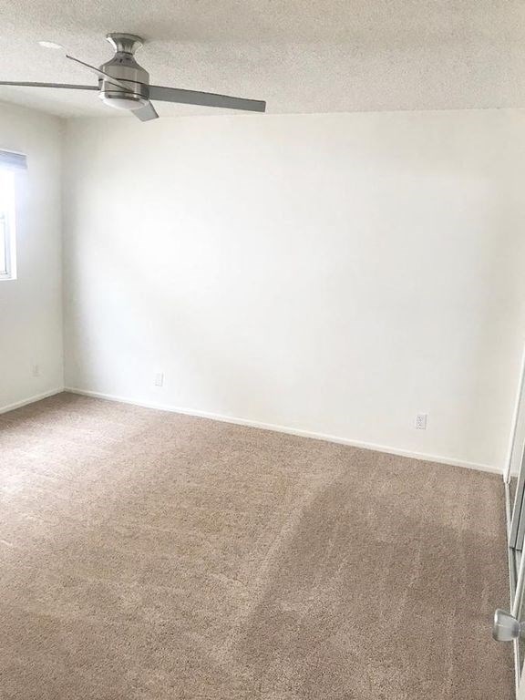 1301 Havenhurst unfurnished bedroom with ceiling fan