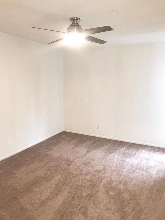 1301 Havenhurst unfurnished bedroom with ceiling fan