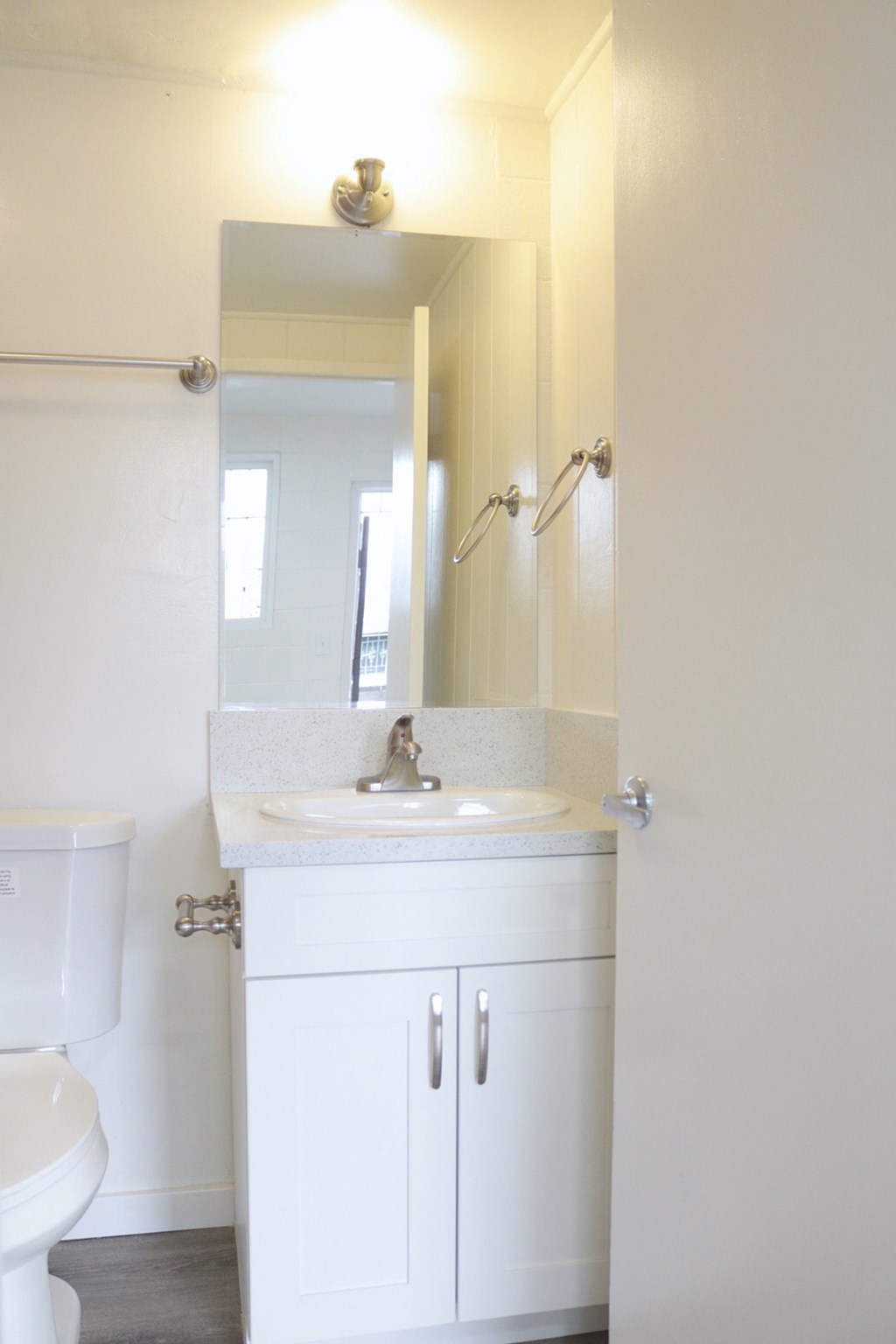 2048 South Beretania Street Apartments bathroom sink, mirror, and cabinets