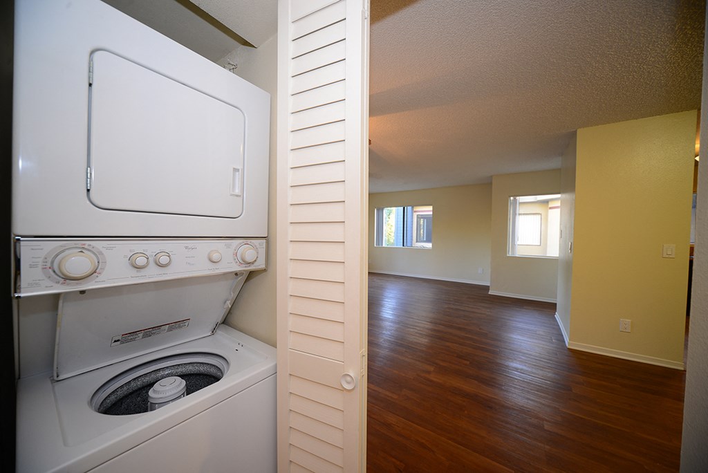 Monarch Terrace laundry room with washer and dryer