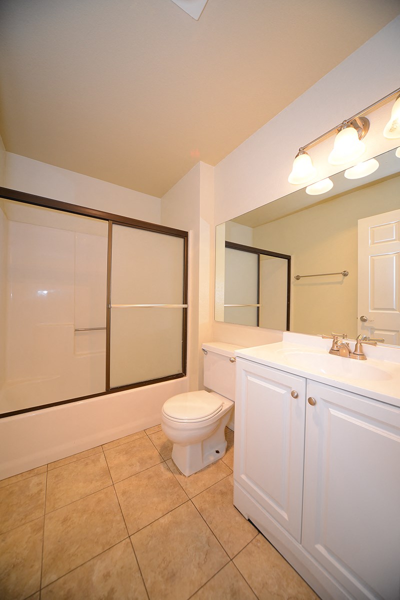 Monarch Terrace bathroom vanity, toilet, and shower