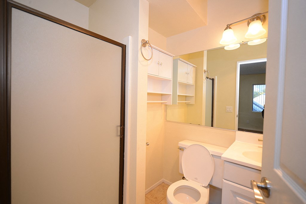 Monarch Terrace bathroom vanity, toilet, and shower