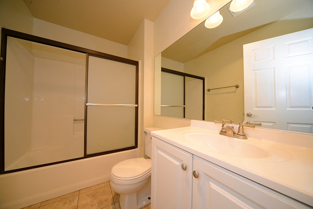 Monarch Terrace bathroom vanity, toilet, and shower