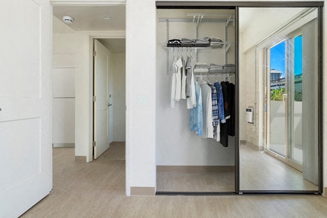 Kanekapolei Collection Bedroom with mirror doors on the Closet