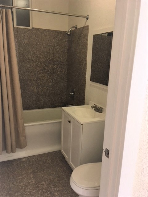 520 Taylor bathroom vanity, toilet, and shower