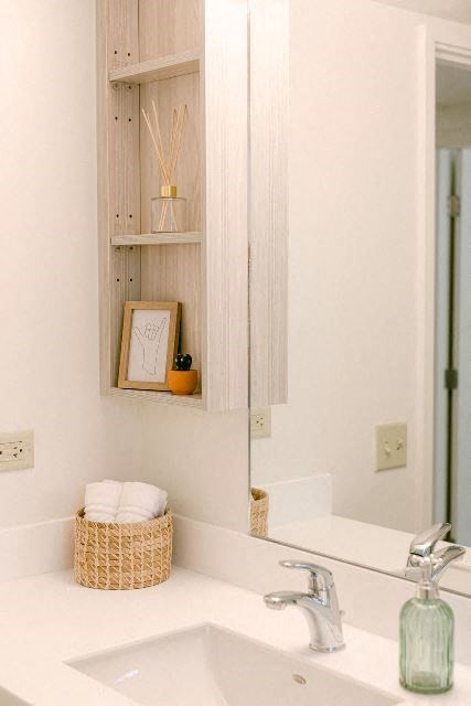 Kanekapolei Collection Bathroom Vanity, sink, and mirror with decor