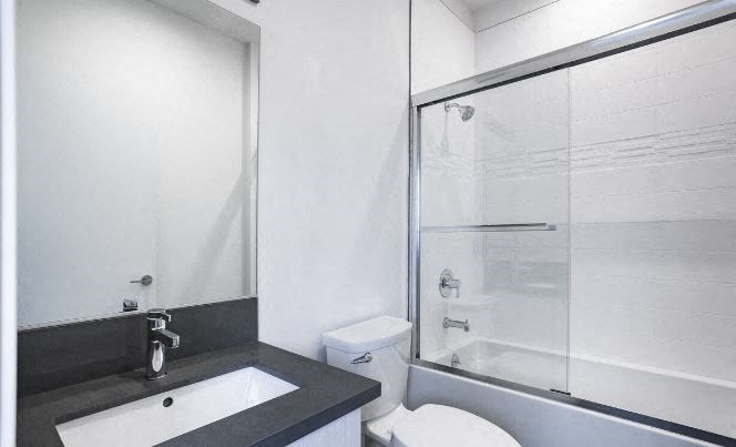 3475 Bentley bathroom vanity, toilet, and shower