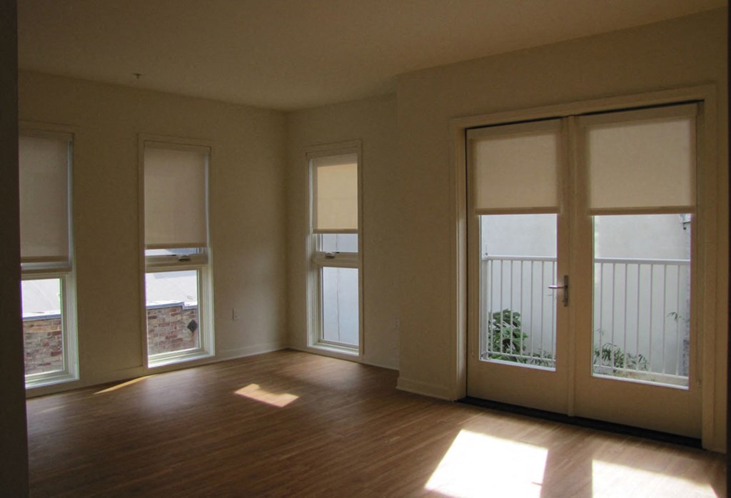 Mayfair Residences spacious bedroom with tall windows