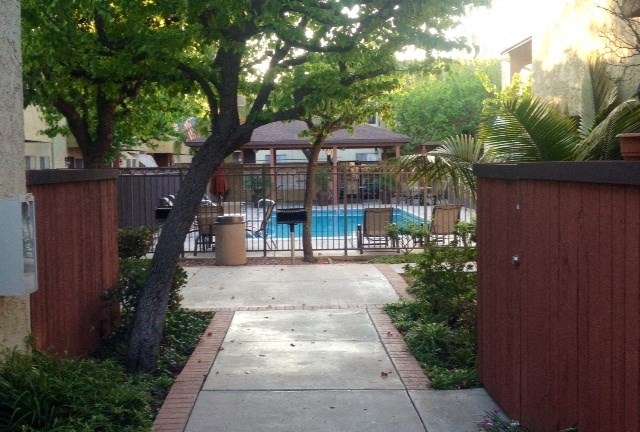 Villa del Sol Apartments pool area pathway