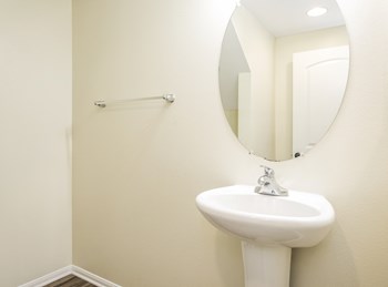 Parkside Villas bathroom sink and mirror - Photo Gallery 34