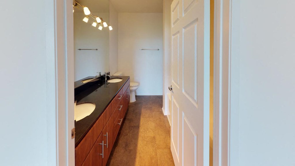 5015 Clinton Apartments bathroom with two sinks