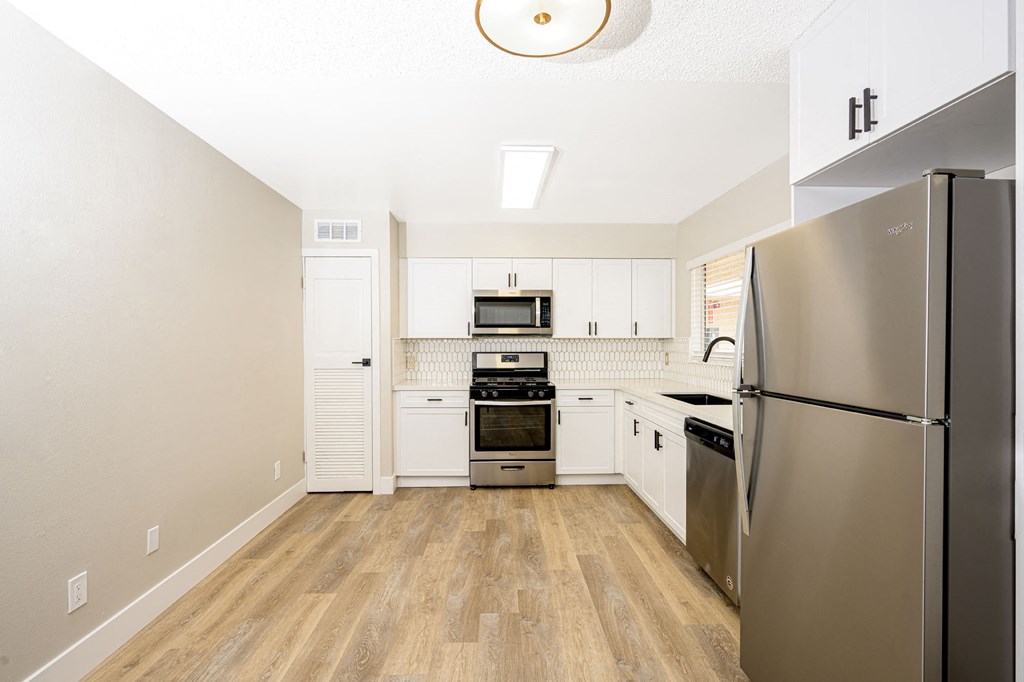 535 N. Hobart Apartments kitchen area with appliances and cabinets
