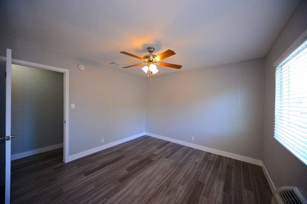 Atrium Court unfurnished bedroom view of window