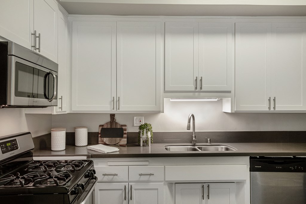 Axiom Westwood Kitchen with White Cabinets and Stainless Steel Appliances