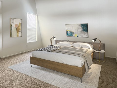 a bedroom with a bed and paintings on the wall