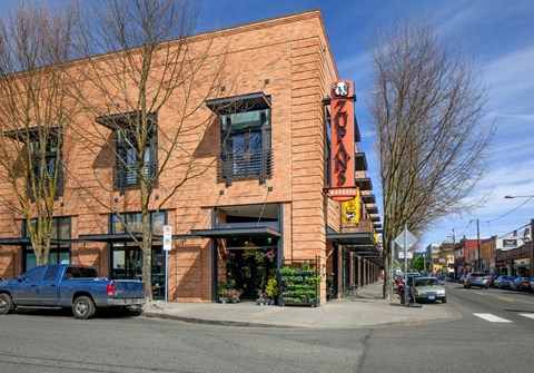 A brick building with a sign that says "NORTH" on it.