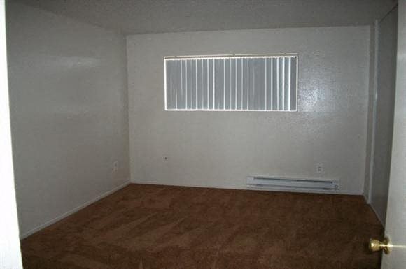 Village Townhomes bedroom with window Village Townhomes bedroom with window