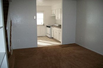 Village Townhomes living room and kitchen Village Townhomes living room and kitchen - Photo Gallery 3