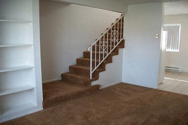 Village Townhomes living room and stairs