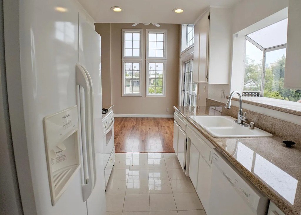 Carmelina Lofts unit 201 large windows