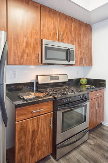 5015 Clinton Apartments kitchen oven, microwave, and stove