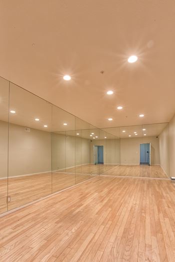 5015 Clinton Apartments empty dance room with mirrors