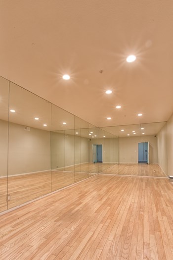 5015 Clinton Apartments empty dance room with mirrors 5015 Clinton Apartments empty dance room with mirrors - Photo Gallery 5