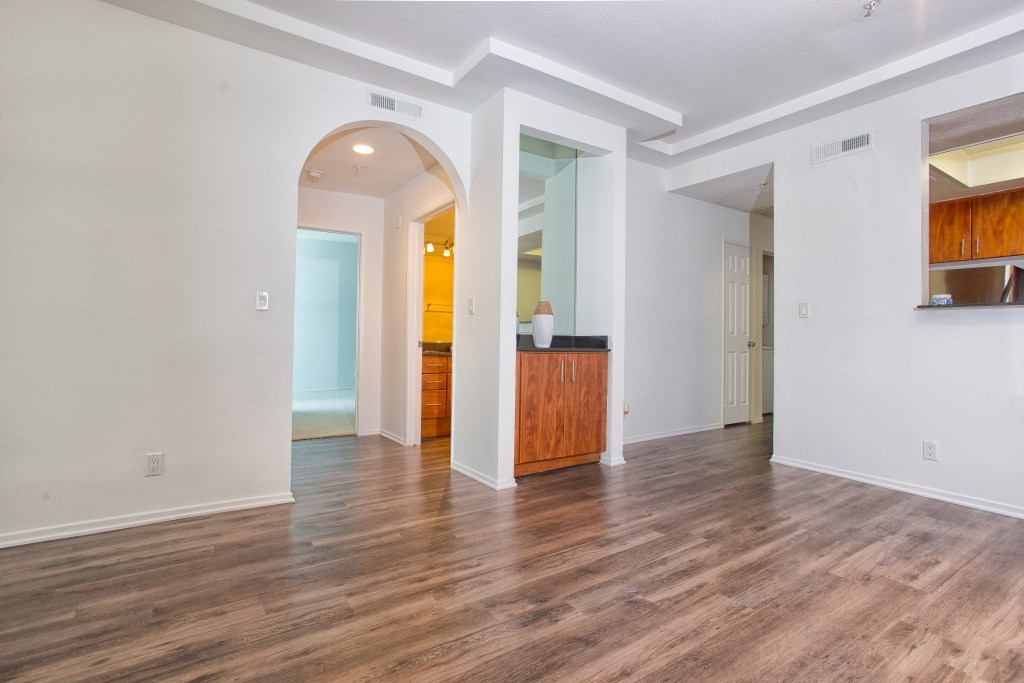 5015 Clinton Apartments unfurnished living area with wooden floors