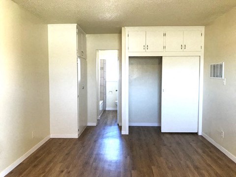 Cook Street Apartments interior room with closet and doorway