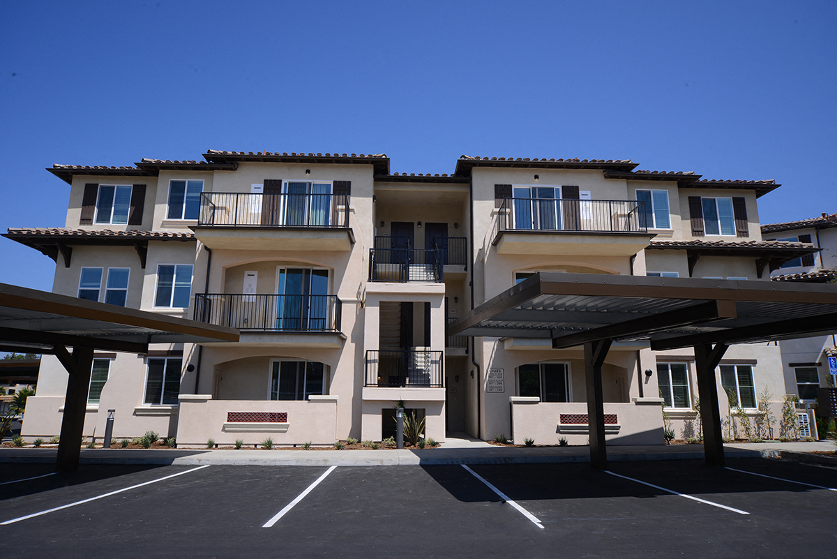 Yolo Apartments Building Exterior and Parking Lot