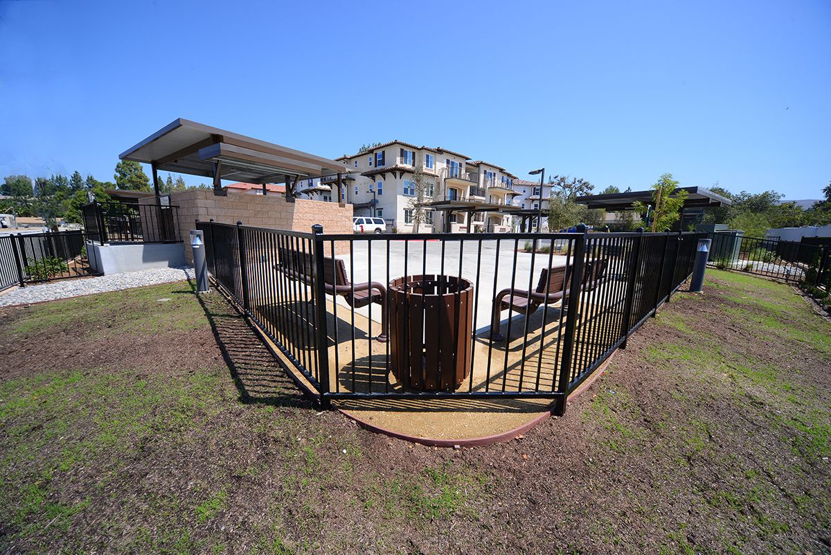 Yolo Apartments Exterior Lawn and Gate