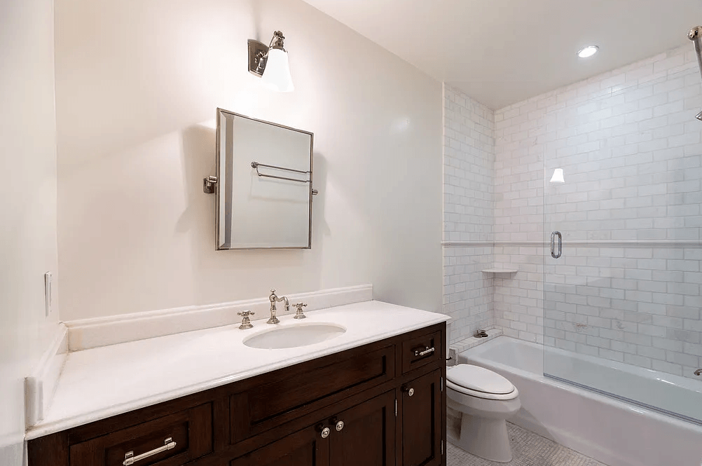 a bathroom with a sink toilet and bathtub