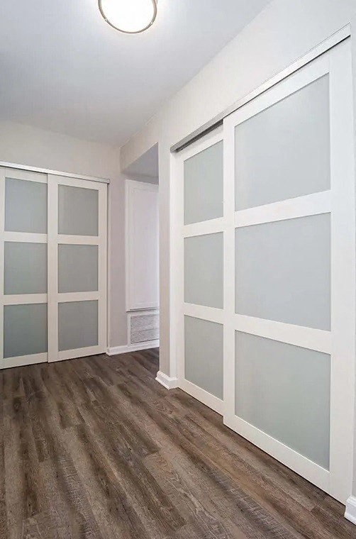 Indie Fairview  empty room with a closet with white doors