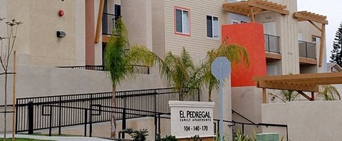 El Pedregal Apartments exterior building and wheelchair ramp