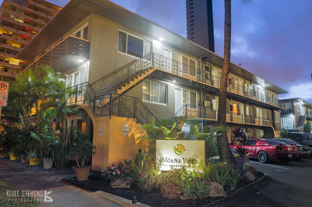 Moana Vista Apartments exterior building and signage at night