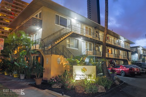 Moana Vista Apartments exterior building and signage at night