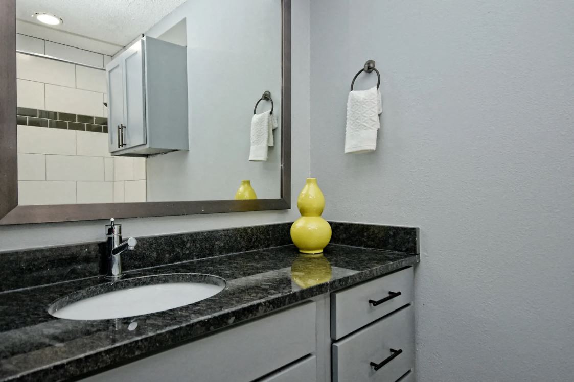 Fashionaire Bathroom sink, mirror, and counter