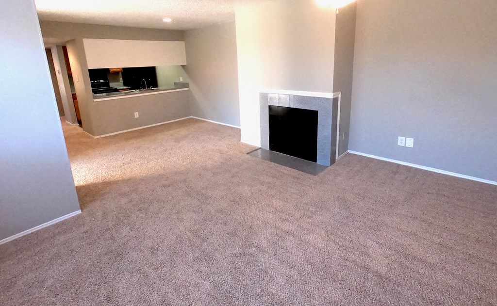 The Forest at Duck Creek living area with fireplace