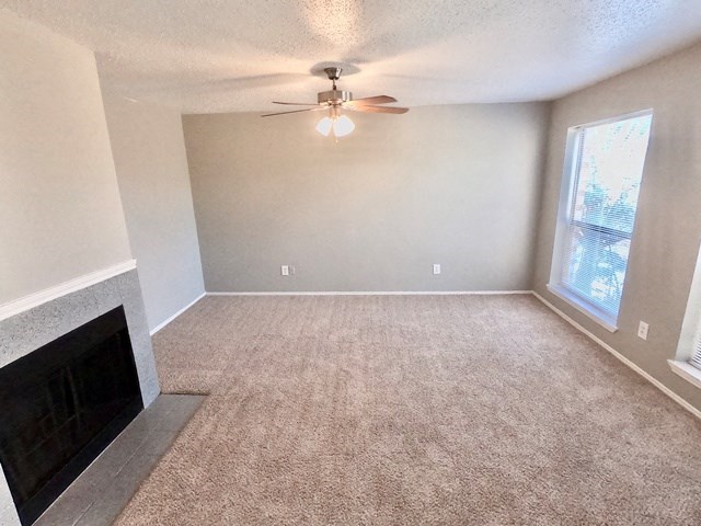 The Forest at Duck Creek living area with fireplace